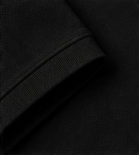 Polo Piquet Essencial na cor preto, detalhe do punho