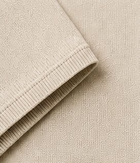 Polo Tricot Signature na cor areia, detalhe do punho