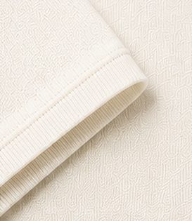 Polo Tricot Signature na cor off-white, detalhe do punho