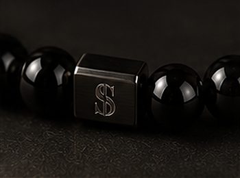Pulseira Pedra Natural na cor ônix, detalhe: outro